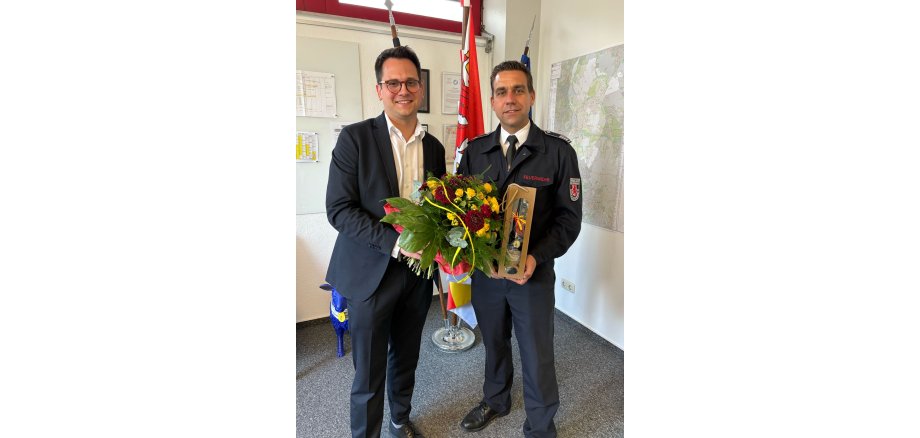 Dr. Benjamin Fadavian gratuliert Carsten Schütte