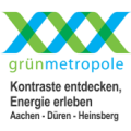 Logo: Drei X in grün und blau mit dem Schriftzug grünmetropole Kontraste entdecken Energie erleben
