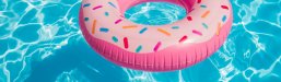 Banner Schwimmbad Reifen Banner Schwimmbad pinker Reifen im Wasser